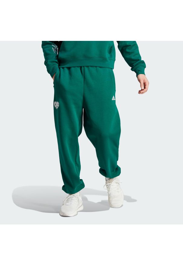 Adidas - Spodnie Scribble Fleece. Kolor: zielony