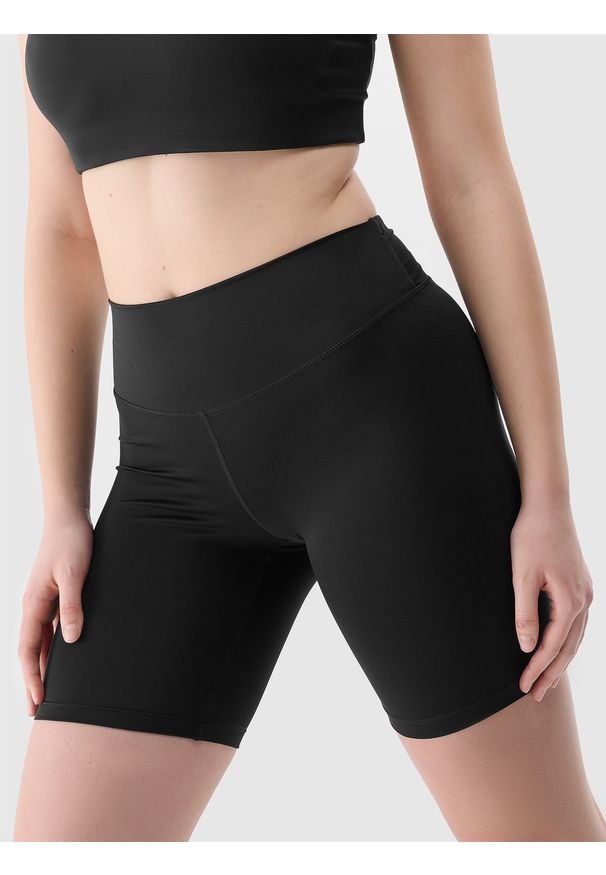 4f - 4F Legginsy kolarki treningowe z materiału z recyklingu damskie - czarne L. Kolor: czarny. Materiał: materiał. Wzór: jednolity, gładki, ze splotem. Sport: fitness