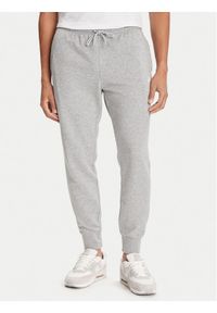 Nike Spodnie dresowe Club Fleece FN3801 Szary Regular Fit. Kolor: szary. Materiał: bawełna