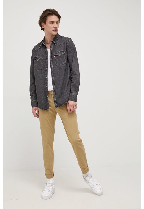 Levi's® - Levi's spodnie 511 męskie kolor beżowy dopasowane. Okazja: na spotkanie biznesowe. Kolor: beżowy. Materiał: materiał, tkanina. Wzór: gładki. Styl: biznesowy