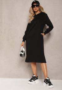 Renee - Czarna Sukienka Dresowa Oversize z Kapturem Elderre. Okazja: na co dzień. Typ kołnierza: kaptur. Kolor: czarny. Wzór: jednolity. Typ sukienki: oversize. Materiał: dresówka. Długość rękawa: długi rękaw. Styl: sportowy, casual. Długość: midi
