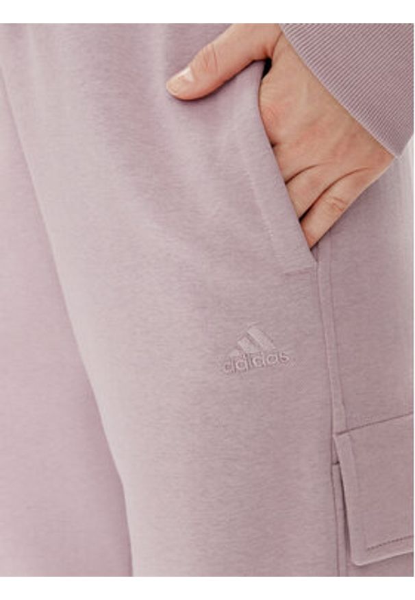 Adidas - adidas Spodnie dresowe ALL SZN Fleece Cargo IW1216 Fioletowy Loose Fit. Kolor: fioletowy. Materiał: bawełna, syntetyk