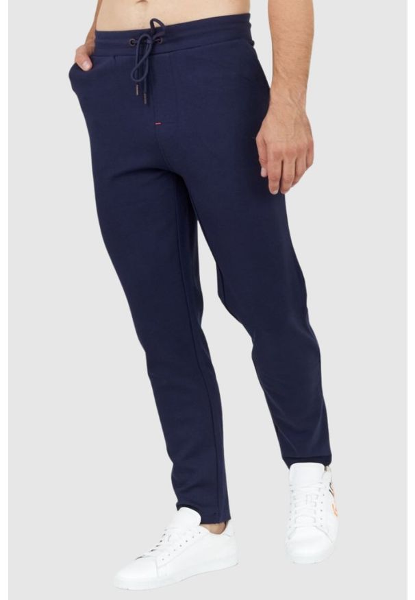 Aeronautica Militare - AERONAUTICA MILITARE Granatowe spodnie męskie dresowe, Rozmiar S. Kolor: niebieski. Materiał: wiskoza, dresówka