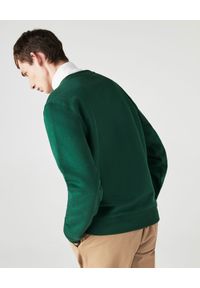 Lacoste - LACOSTE - Zielona bluza z logo. Okazja: na co dzień. Typ kołnierza: golf. Kolor: zielony. Materiał: bawełna, jeans. Długość rękawa: długi rękaw. Długość: długie. Wzór: haft. Styl: casual, elegancki