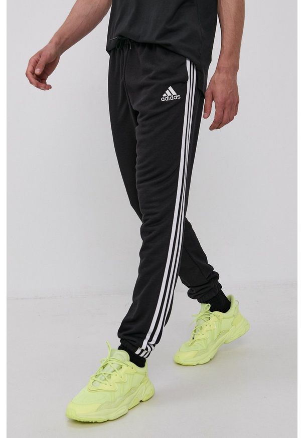 Adidas - adidas Spodnie GK8829 męskie kolor czarny gładkie. Kolor: czarny. Wzór: gładki