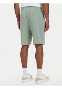 TOMMY HILFIGER - Tommy Hilfiger Szorty sportowe Essential UM0UM03914 Zielony jasny Regular Fit. Kolor: zielony. Materiał: bawełna. Styl: sportowy #3