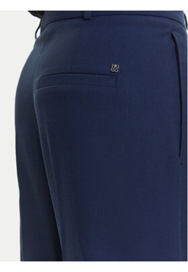 Hugo - HUGO Spodnie materiałowe Harenau 50542606 Granatowy Relaxed Fit. Kolor: niebieski. Materiał: bawełna
