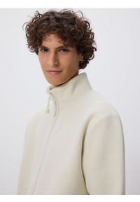 Reserved - Polarowa bluza ze stójką - złamana biel. Typ kołnierza: kołnierzyk stójkowy. Materiał: polar #1