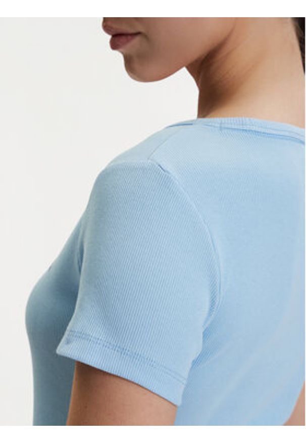 Tommy Jeans T-Shirt DW0DW17385 Niebieski jasny Slim Fit. Kolor: niebieski. Materiał: bawełna