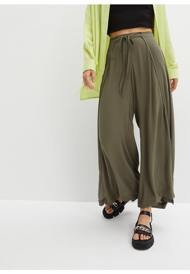 bonprix - Spodnie z lejącej wiskozy. Kolor: zielony. Materiał: wiskoza