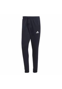 Długie Spodnie Dresowe Adidas Fit Tapered Cuff Niebieski. Kolor: biały, wielokolorowy, niebieski. Materiał: dresówka. Długość: długie