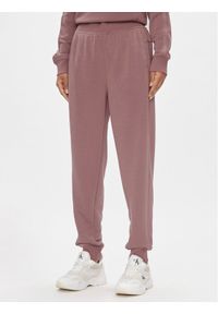 Calvin Klein Performance Spodnie dresowe 00GWS4P656 Różowy Relaxed Fit. Kolor: różowy. Materiał: syntetyk