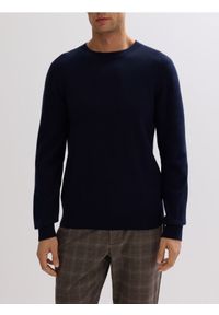 Reserved - Sweter z wełny merino - granatowy. Kolor: niebieski. Materiał: wełna
