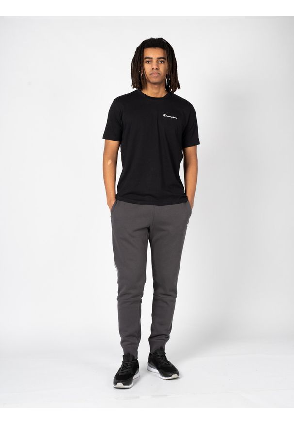 Champion Spodnie "Sweat Pants" | 217833 | Mężczyzna | Szary. Okazja: na co dzień. Kolor: szary. Materiał: bawełna, poliester. Wzór: nadruk. Styl: casual, sportowy