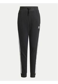Adidas - adidas Spodnie dresowe Trefoil IY7484 Czarny Regular Fit. Kolor: czarny. Materiał: bawełna #4