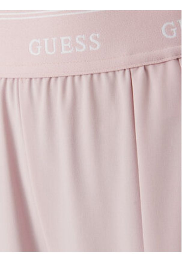 Guess Spodnie materiałowe V6GB08 W1771 Różowy jasny Regular Fit. Kolor: różowy. Materiał: syntetyk