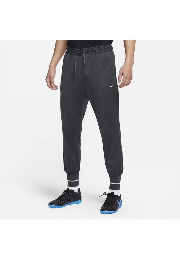 Spodnie męskie treningowe Nike Strike Jogging Pants szare. Kolor: biały, szary, wielokolorowy. Sport: bieganie