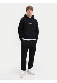 Jack & Jones - Jack&Jones Spodnie dresowe Kane Soho 12278943 Czarny Regular Fit. Kolor: czarny. Materiał: bawełna