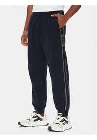 EA7 Emporio Armani Spodnie dresowe 7M000545 AF12660 UB102 Granatowy Modern Fit. Kolor: niebieski. Materiał: bawełna
