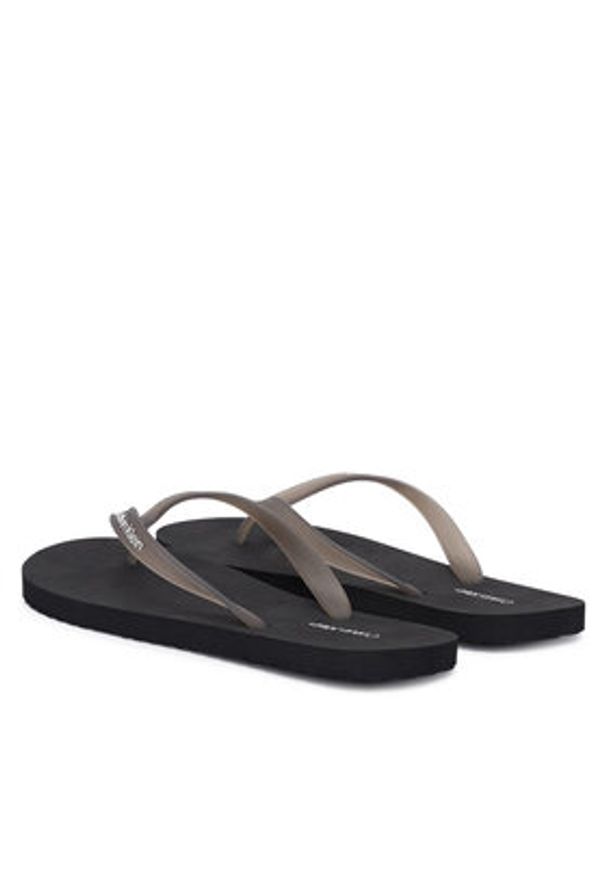 Calvin Klein Japonki Beach Thong Slide HM0HM02105 Czarny. Kolor: czarny. Materiał: syntetyk