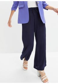 bonprix - Spodnie Marlena z lejącej wiskozy. Kolor: niebieski. Materiał: wiskoza #1