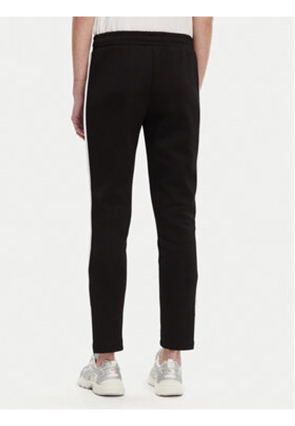 Puma Spodnie dresowe T7 Always On 629798 Czarny Slim Fit. Kolor: czarny. Materiał: syntetyk, bawełna