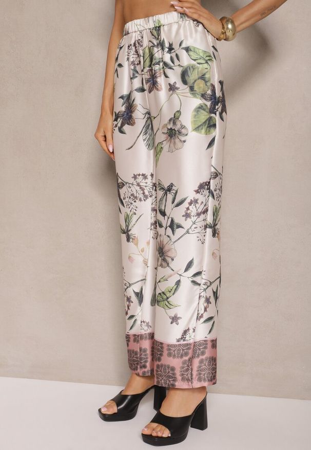 Renee - Beżowe Spodnie z Wiskozą o Szerokim Kroju High Waist w Kwiaty Davilsa. Okazja: na co dzień. Stan: podwyższony. Kolor: beżowy. Materiał: wiskoza. Wzór: kwiaty. Styl: casual
