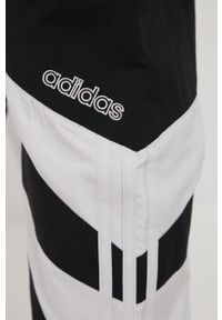 adidas Originals spodnie męskie kolor czarny joggery. Kolor: czarny. Materiał: materiał, poliester, tkanina