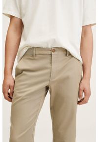 Mango Man spodnie męskie kolor beżowy dopasowane. Kolor: beżowy. Materiał: tkanina, włókno. Wzór: gładki #3