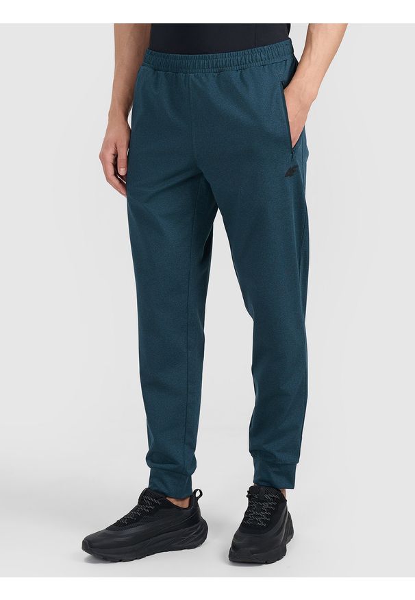 4f - 4F Spodnie treningowe szybkoschnące męskie - granatowe M. Kolor: niebieski. Materiał: tkanina, elastan, włókno, syntetyk, materiał. Sport: fitness