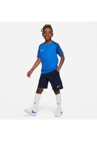 Spodnie treningowe chłopięce Nike Park 20. Kolor: biały, brązowy, niebieski, czarny, wielokolorowy. Długość: krótkie. Sport: piłka nożna #1