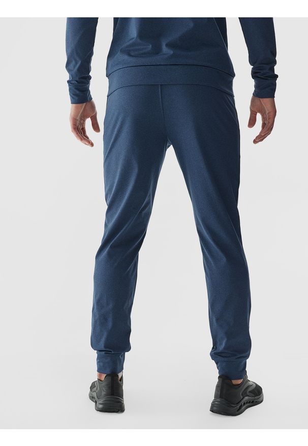 4f - 4F Spodnie treningowe szybkoschnące męskie - granatowe 3XL. Kolor: niebieski. Materiał: dzianina, materiał, syntetyk, włókno, elastan. Wzór: ze splotem, jednolity. Sport: fitness
