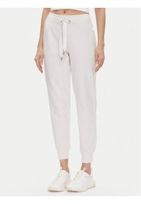 DKNY Sport Spodnie dresowe DP5P3496 Beżowy Regular Fit. Kolor: beżowy. Materiał: bawełna #1