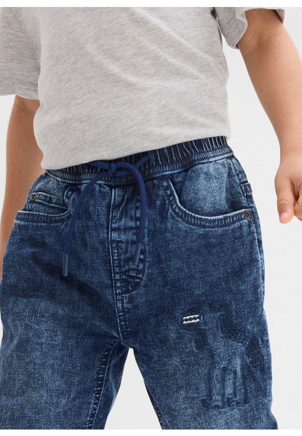 bonprix - Dżinsy z termiczną podszewką z dżerseju, z gumką w talii, regular fit. Kolor: niebieski