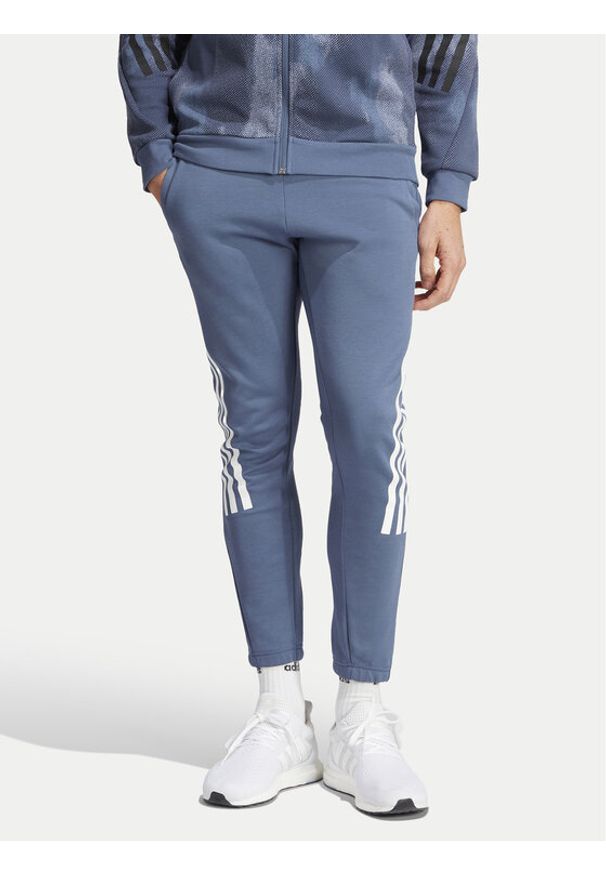 Adidas - adidas Spodnie dresowe Future Icons 3-Stripes IR9194 Niebieski Slim Fit. Kolor: niebieski. Materiał: bawełna