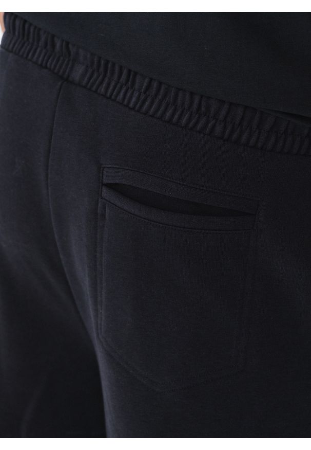 Pako Lorente - Dzianinowe spodnie dresowe w granatowym kolorze. Okazja: na co dzień. Kolor: niebieski. Materiał: dresówka, dzianina. Wzór: gładki. Styl: casual