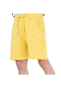 Spodenki Alpha Industries Organics Jogger Short 106365647 - żółte. Kolor: żółty. Materiał: materiał, bawełna. Wzór: aplikacja