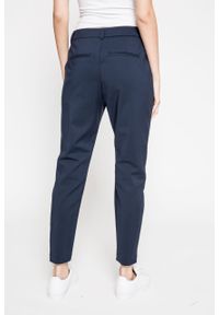 Vero Moda - Spodnie Victoria. Kolor: niebieski. Materiał: tkanina, bawełna, nylon, elastan. Wzór: gładki #2