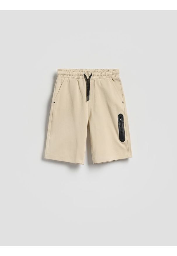 Reserved - Bawełniane szorty - beżowy. Kolor: beżowy. Materiał: bawełna