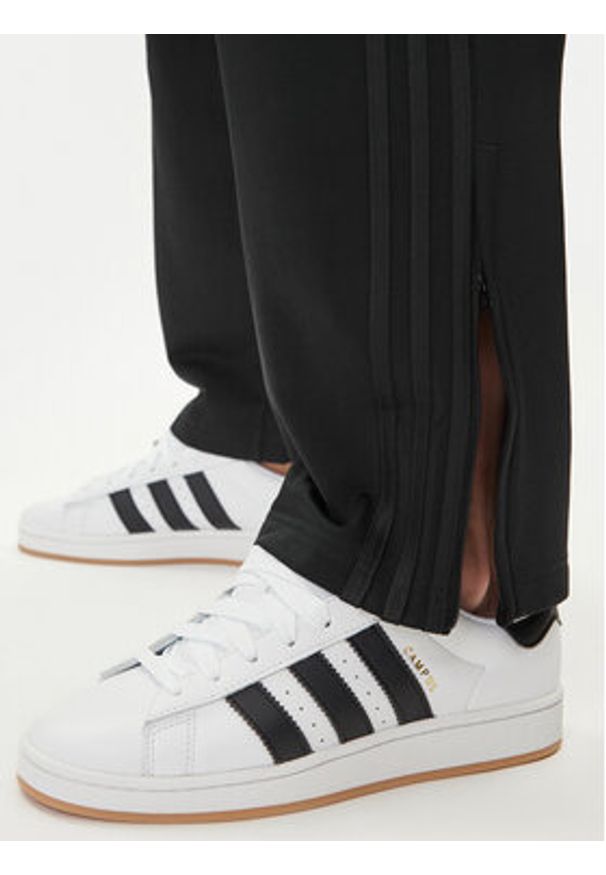 Adidas - adidas Spodnie dresowe adicolor Classics Firebird JY1350 Czarny Regular Fit. Kolor: czarny. Materiał: syntetyk