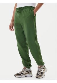 New Balance Spodnie dresowe MP41508 Zielony Relaxed Fit. Kolor: zielony. Materiał: bawełna #1