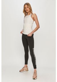 Calvin Klein Jeans - Legginsy. Kolor: czarny. Materiał: bawełna, dzianina, elastan. Wzór: nadruk #4