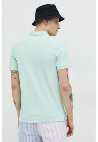 Abercrombie & Fitch polo męski kolor zielony z aplikacją. Typ kołnierza: polo. Kolor: zielony. Materiał: skóra, dzianina, materiał. Długość: krótkie. Wzór: aplikacja #3