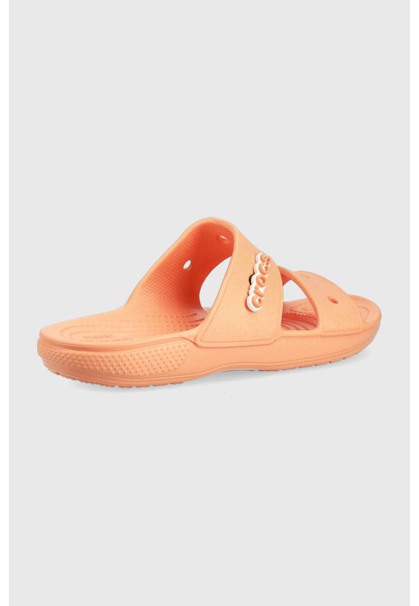Crocs klapki damskie kolor pomarańczowy. Kolor: pomarańczowy. Materiał: materiał. Wzór: gładki. Obcas: na obcasie. Wysokość obcasa: niski