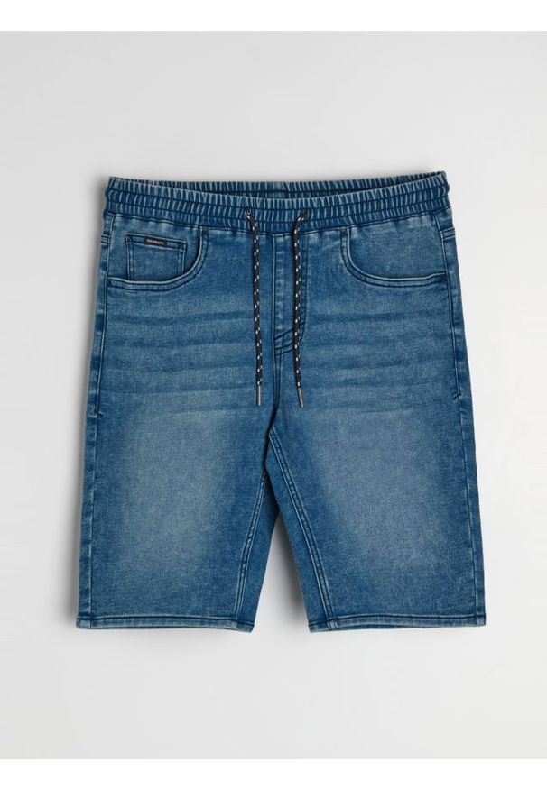 Sinsay - Szorty jeansowe z efektem sprania - niebieski. Kolor: niebieski. Materiał: jeans