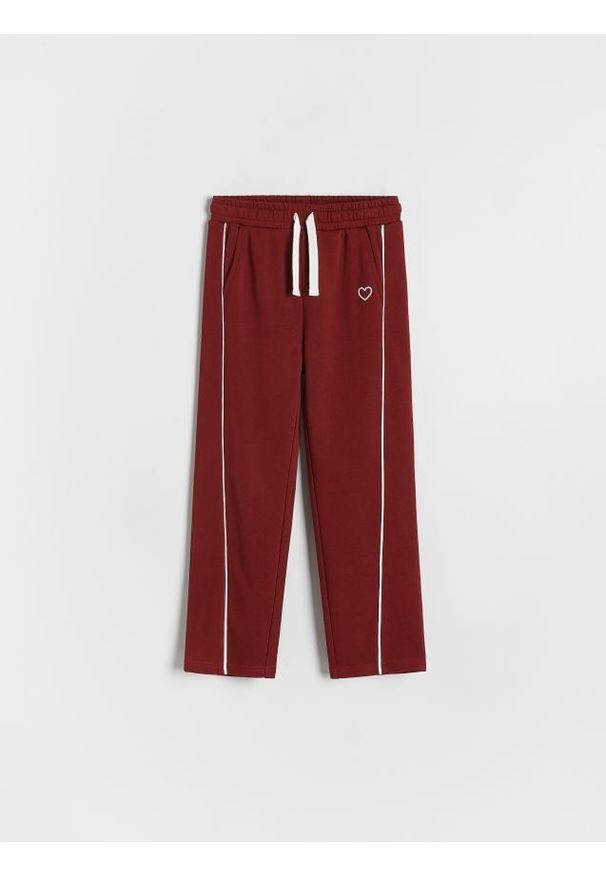 Reserved - Spodnie dresowe z przeszyciami - bordowy. Kolor: czerwony. Materiał: dresówka