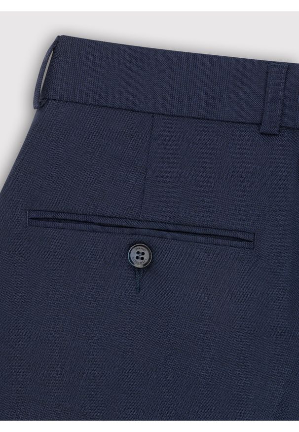 Pako Lorente - PAKO LORENTE – Spodnie garniturowe w kolorze granatowym. Kolor: niebieski. Materiał: wełna, poliester, elastan. Styl: elegancki