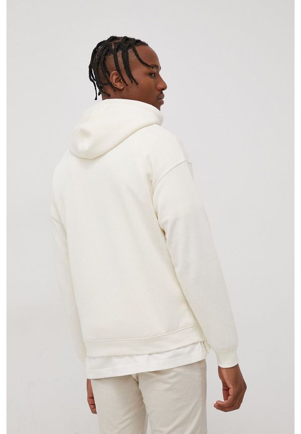 Jack & Jones Bluza męska kolor kremowy z kapturem z nadrukiem. Typ kołnierza: kaptur. Kolor: beżowy. Materiał: dzianina. Wzór: nadruk
