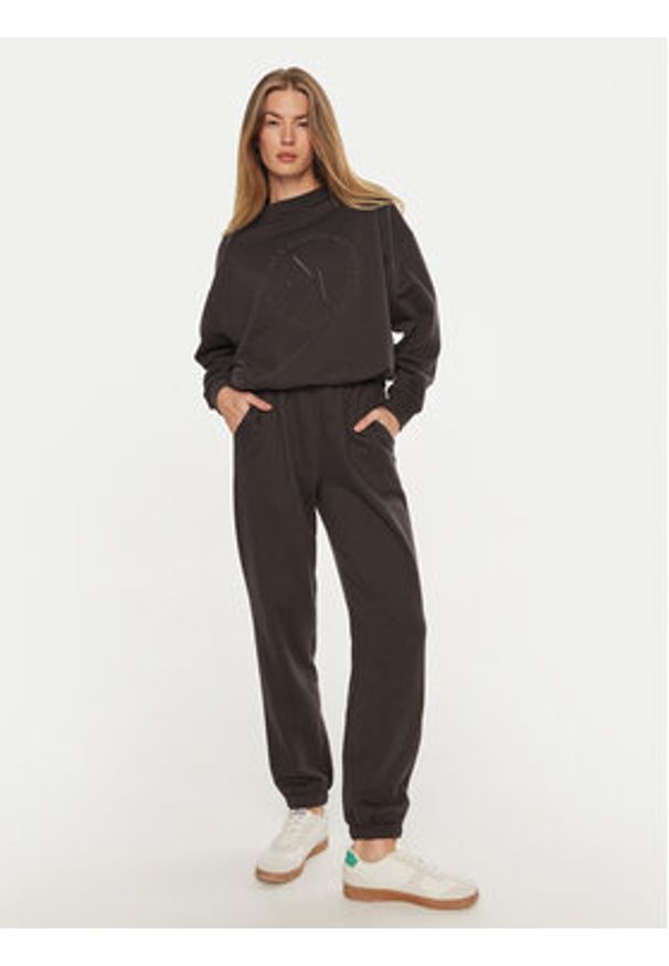 Athlecia Spodnie dresowe Damla EA243322 Brązowy Loose Fit. Kolor: brązowy. Materiał: syntetyk, bawełna
