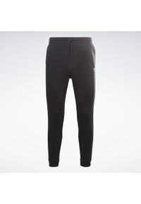 Spodnie treningowe męskie Reebok Left Leg Jogger. Kolor: czarny. Materiał: dresówka. Sport: fitness